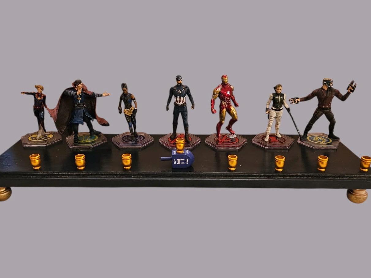 Avengers menorah — Marvel superhero action figures with brass candle cups on wood plaque | Judaica Square Lakewood (view 4)