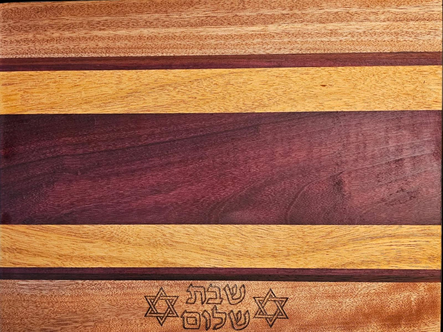 Shabbat Shalom challah board — striped exotic hardwood etched with Hebrew and Jewish stars | Judaica Square Lakewood (view 4)