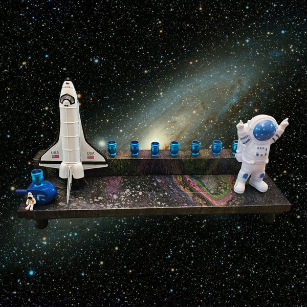 Outer space menorah — die-cast rocketship and astronaut on paint-poured base | Judaica Square Lakewood
