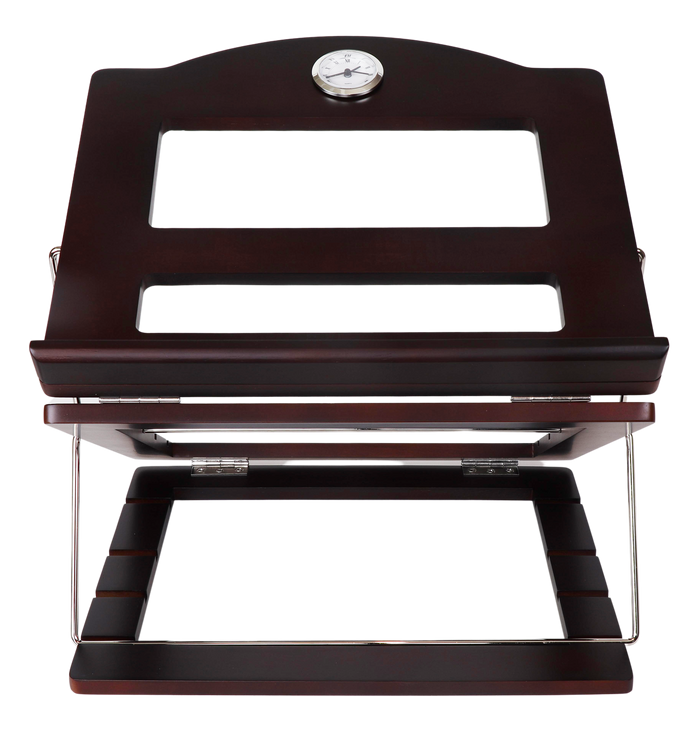Dark wood table top shtender raised on its metal wire support, round clock inset at the top of the slanted panel and two rectangular cutouts below it