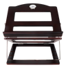 Dark wood table top shtender raised on its metal wire support, round clock inset at the top of the slanted panel and two rectangular cutouts below it