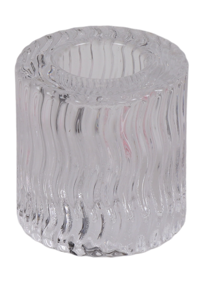 Short clear crystal candle holder with wavy vertical ribbing, side view