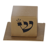 Gold tefillin-shaped favor box with black Hebrew letter Shin on the front, sitting on a flat gold base
