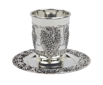 Nickel-plated Kiddush cup embossed with grape clusters on a tray with grapevine border