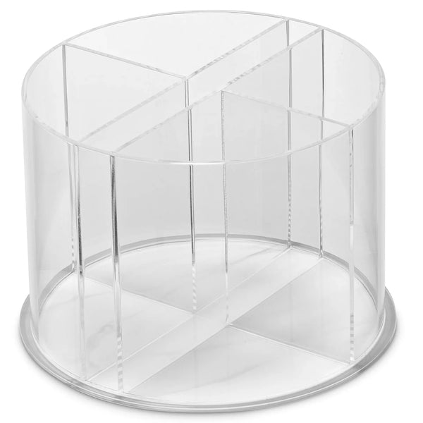 Round clear acrylic cutlery holder divided into four sections on a marble-look base