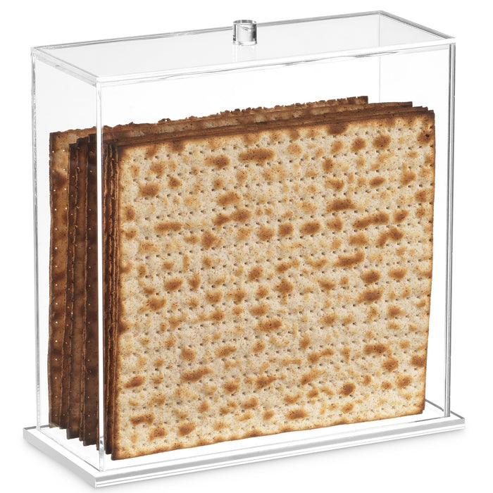 Clear upright acrylic matzah box with lid and small knob, filled with square matzos