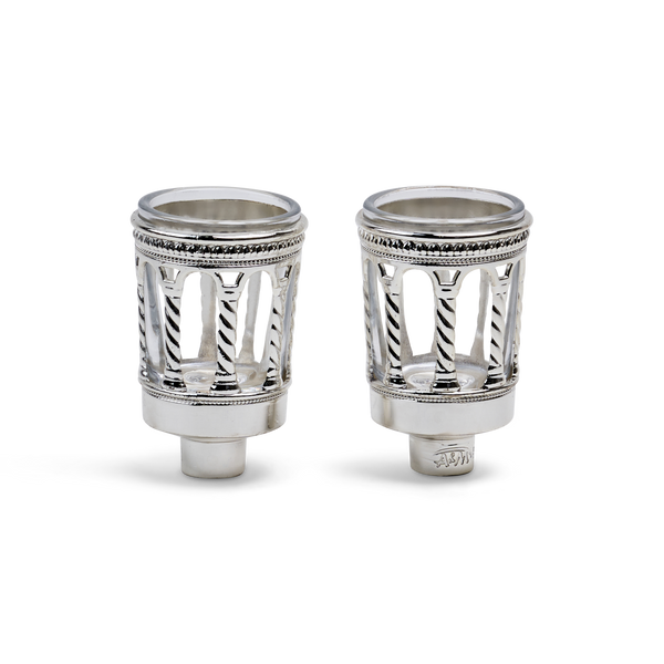 Two silver-plated Royal Palace neronim holders with twisted columns and beaded rims