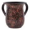 Tulip-shaped washing cup with raised copper web texture over dark background, two handles