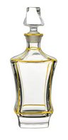 Clear glass wine decanter with waisted squared body outlined in gold and a tall faceted stopper