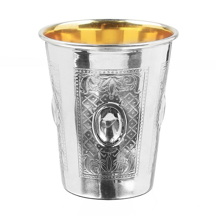 Silver-coated Kiddush cup with engraved lattice panels framing raised oval medallions, gold-tone interior