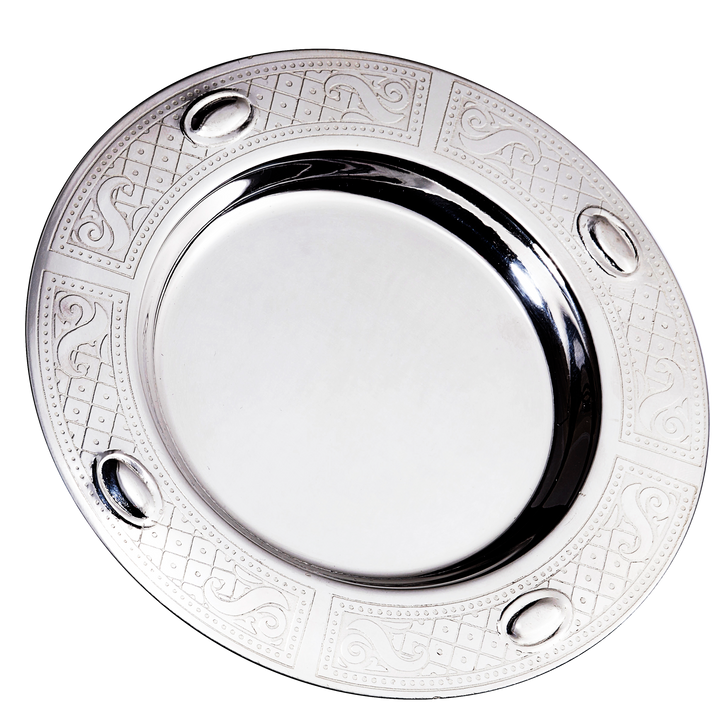 Round silver-coated Kiddush tray with engraved scroll panels and four raised oval medallions on rim