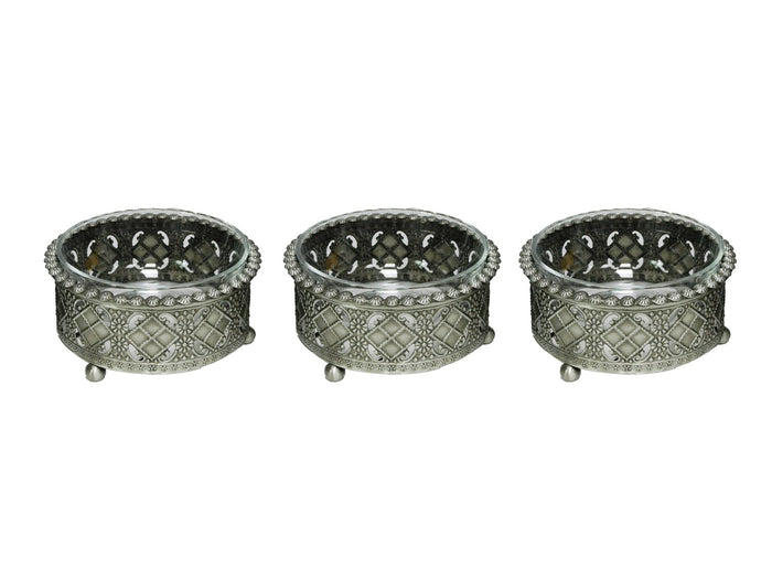 Three round pewter dip bowls with pierced lattice sides, beaded rims and clear inserts