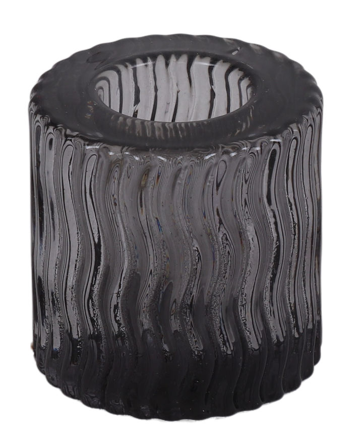Short smoky black crystal candle holder with wavy vertical ribbing, side view