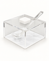 Square clear acrylic honey dish over a white pearl base panel, flat lid with a white square knob and a clear acrylic spoon set through the lid slot