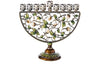 Half-moon jeweled menorah with openwork vines, green leaves, cream buds and a pedestal base