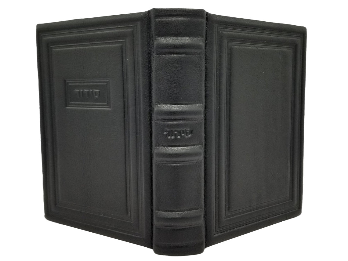 Cover and spine of the Korban Mincha siddur, medium, antique leather in Black