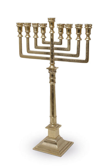 Large brass menorah on a column stem and square base