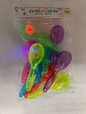 Package of ten colorful 5-inch light-up maracas with several lights illuminated