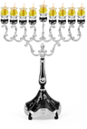Marbleized black and silver-plated oil menorah with lit glass oil cups on a black base