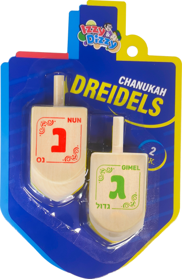 Two large natural wood dreidels with red and green Hebrew letters on a dreidel shaped card