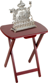 Mahogany finish folding menorah stand, 20 inches high, holding a silver menorah