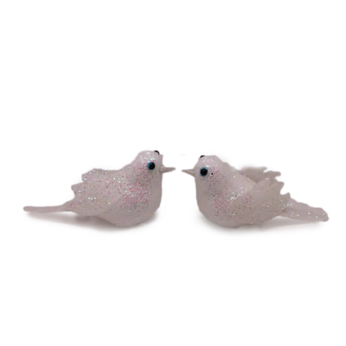 Two white glitter-finish dove decorations facing each other