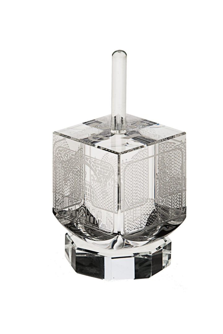 Clear crystal dreidel with silvertone Old Jerusalem engravings on each side, on a crystal base