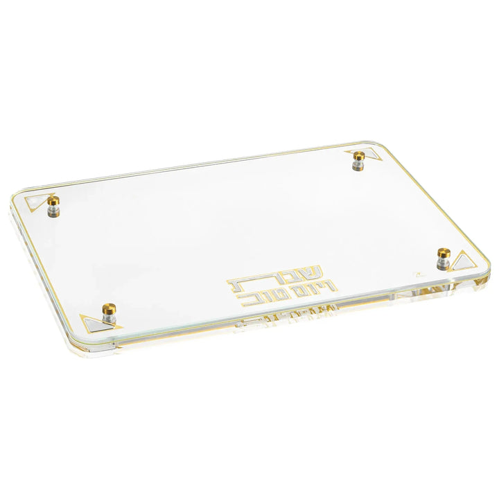 Pearlstone Challah Board flat lay showing the clear acrylic surface and gold corner accents