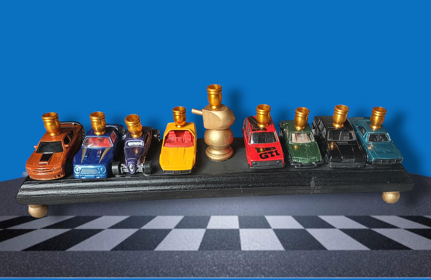 Matchbox car menorah — row of repurposed toy cars with aluminum candle cups | Judaica Square Lakewood (view 7)