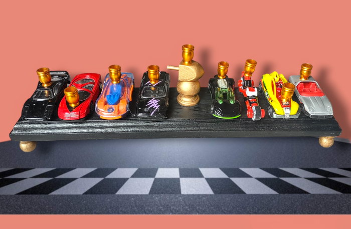 Matchbox car menorah — row of repurposed toy cars with aluminum candle cups | Judaica Square Lakewood