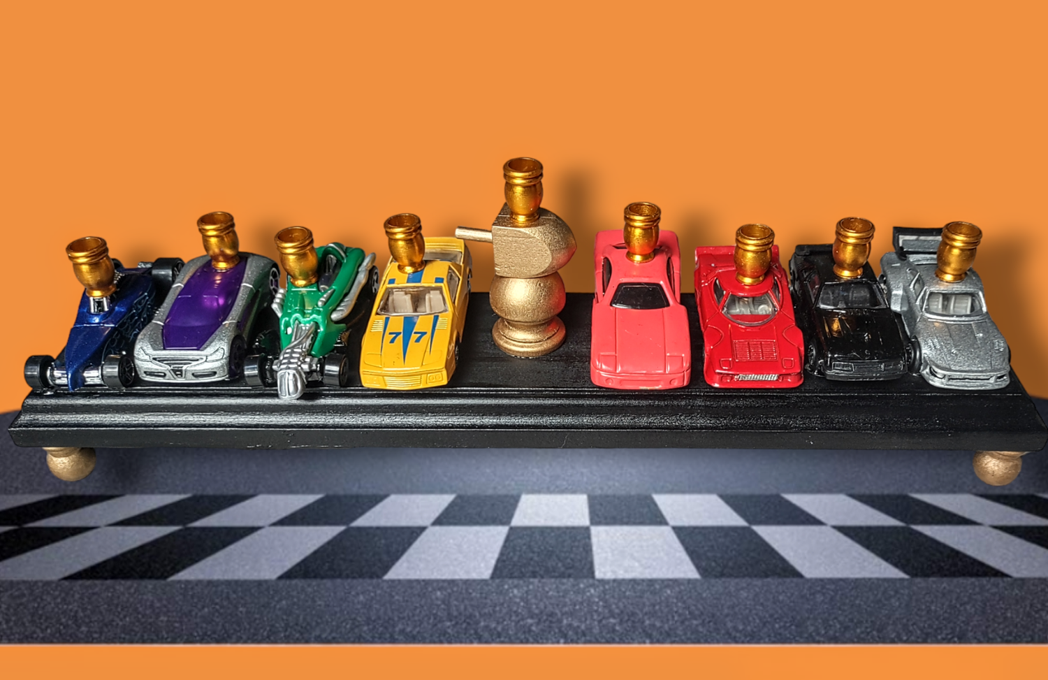 Hot Wheels menorah — die-cast toy cars on wood plaque with gold dreidel trophy | Judaica Square Lakewood (view 3)