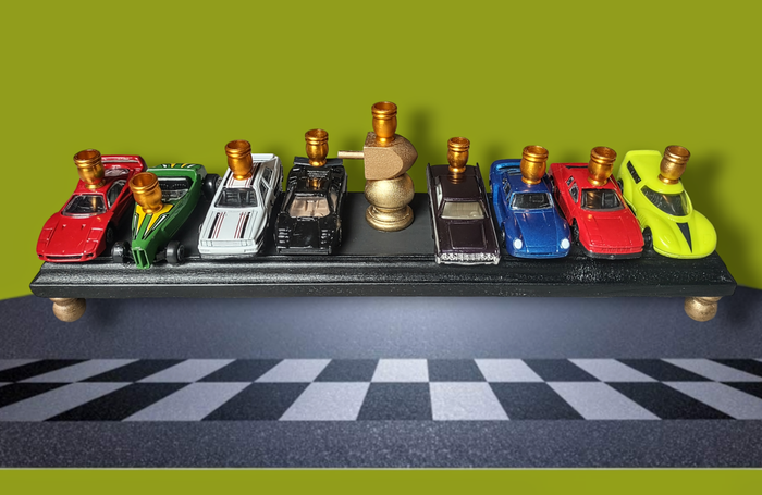 Hot Wheels menorah — die-cast toy cars on wood plaque with gold dreidel trophy | Judaica Square Lakewood