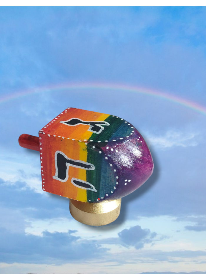 Rainbow Stained Wood Dreidel — rainbow wood stain dreidel on gold stand | Judaica Square Lakewood