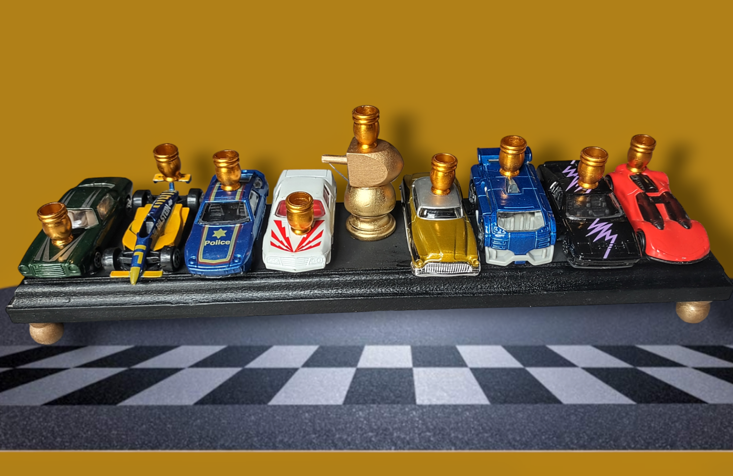 Hot Wheels menorah — die-cast toy cars on wood plaque with gold dreidel trophy | Judaica Square Lakewood (view 9)
