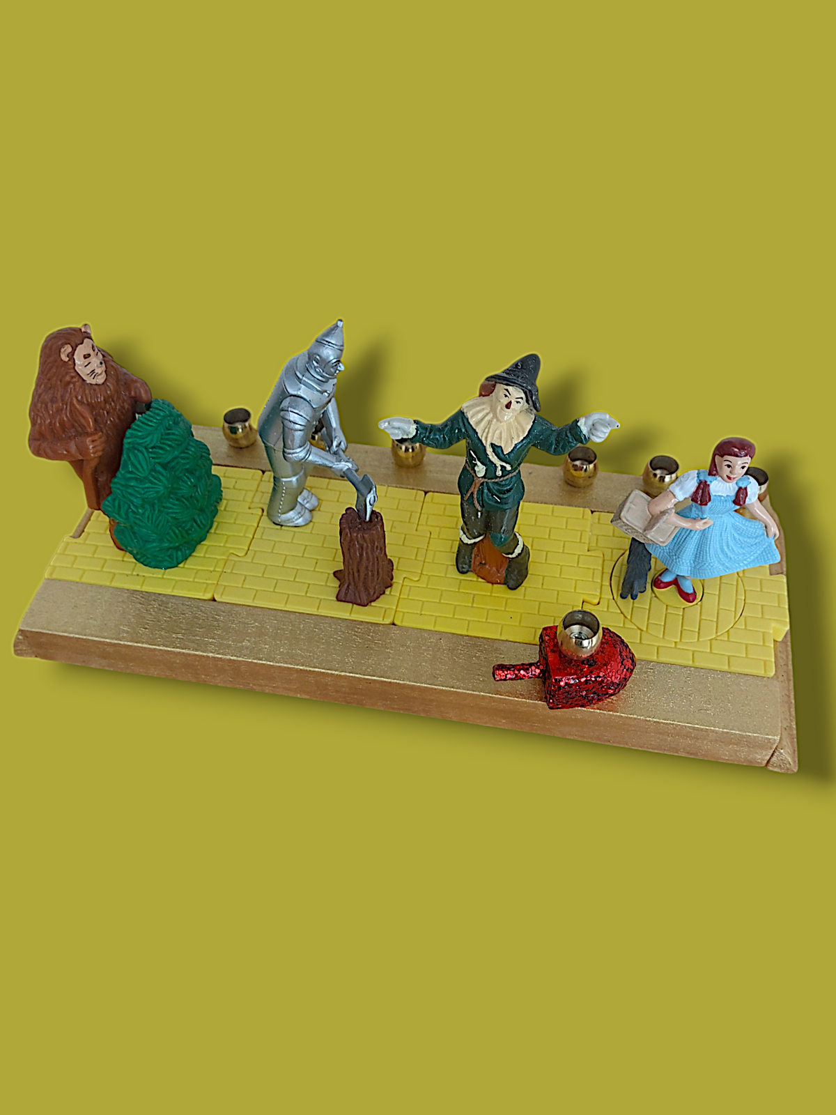 Wizard of Oz menorah — spinning repurposed Oz figures with ruby dreidel and brass cups | Judaica Square Lakewood (view 3)