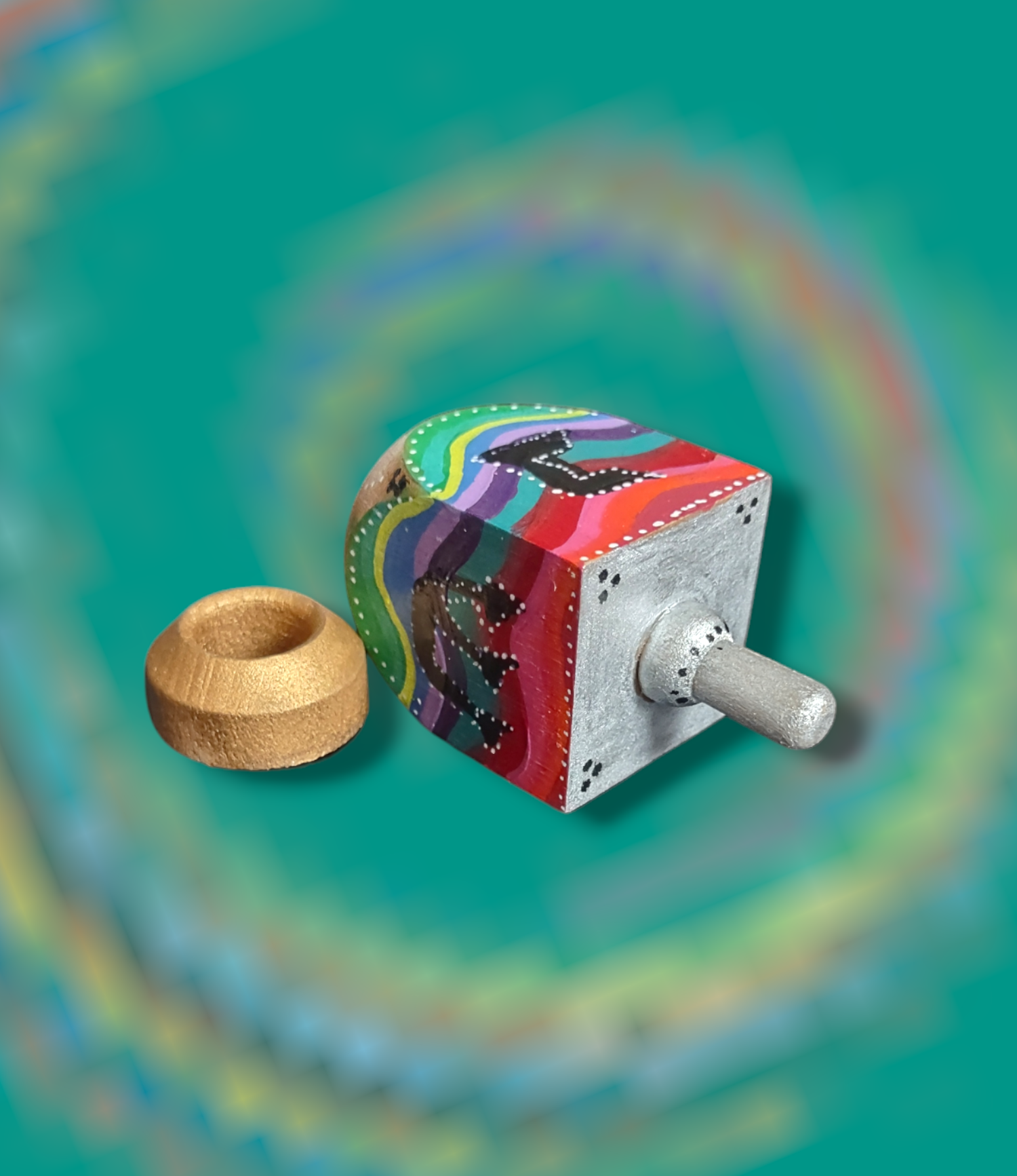Swirl dreidel — colorful hand-painted wooden dreidel with swirling stripes on a stand | Judaica Square Lakewood (view 4)