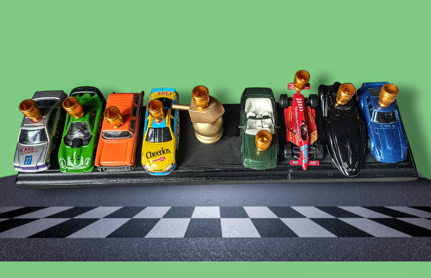 Matchbox car menorah — row of repurposed toy cars with aluminum candle cups | Judaica Square Lakewood (view 4)