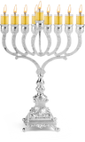 Silver-plated 11 inch oil menorah with lit glass oil cups on curved arms and a footed base