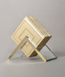 Simchonim Lucite stand holding Noam style zemiros in cream