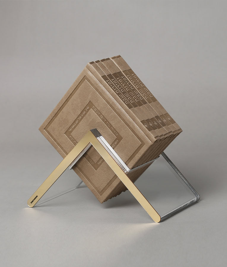Simchonim Lucite stand holding Noam style zemiros in maple brown