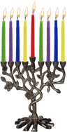 Dark bronze-toned tree-shaped menorah holding colored Chanukah candles