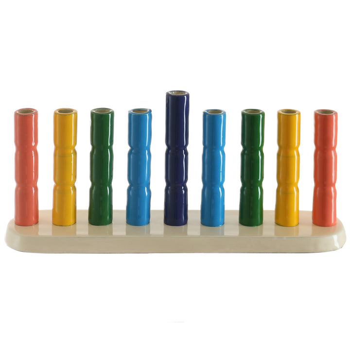 Strip menorah with ribbed rainbow cylinder cups on a cream base and a taller navy center shamash