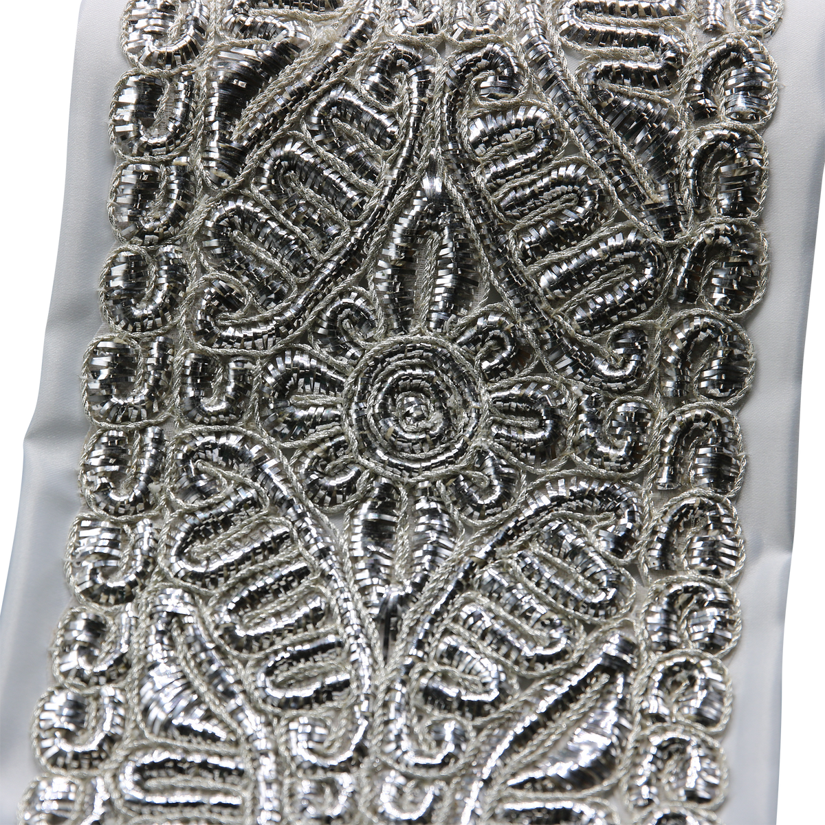 Close-up of traditional silver atarah woven detailing