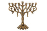 Antiqued gold-tone tulip menorah with scrolling branches, buds and leaves on a petal base