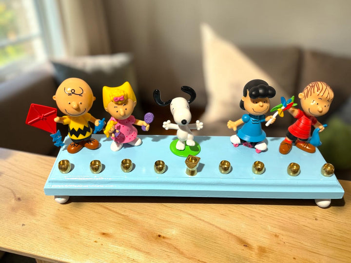 Vintage Peanuts menorah with Charlie Brown and Snoopy