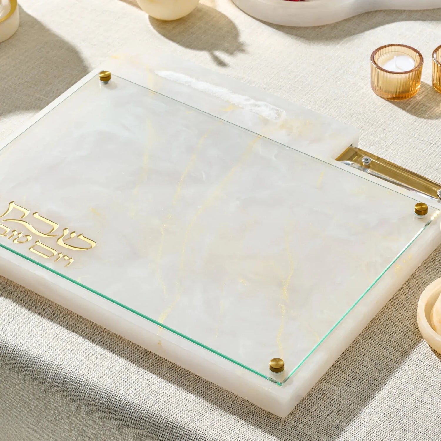 Close-up of glass top and marbled resin base on Waterdale challah board