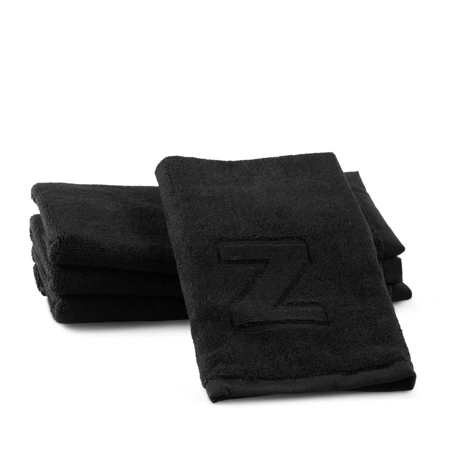 Black Initial Embossed Finger Towel — styled in-room | Judaica Square Lakewood