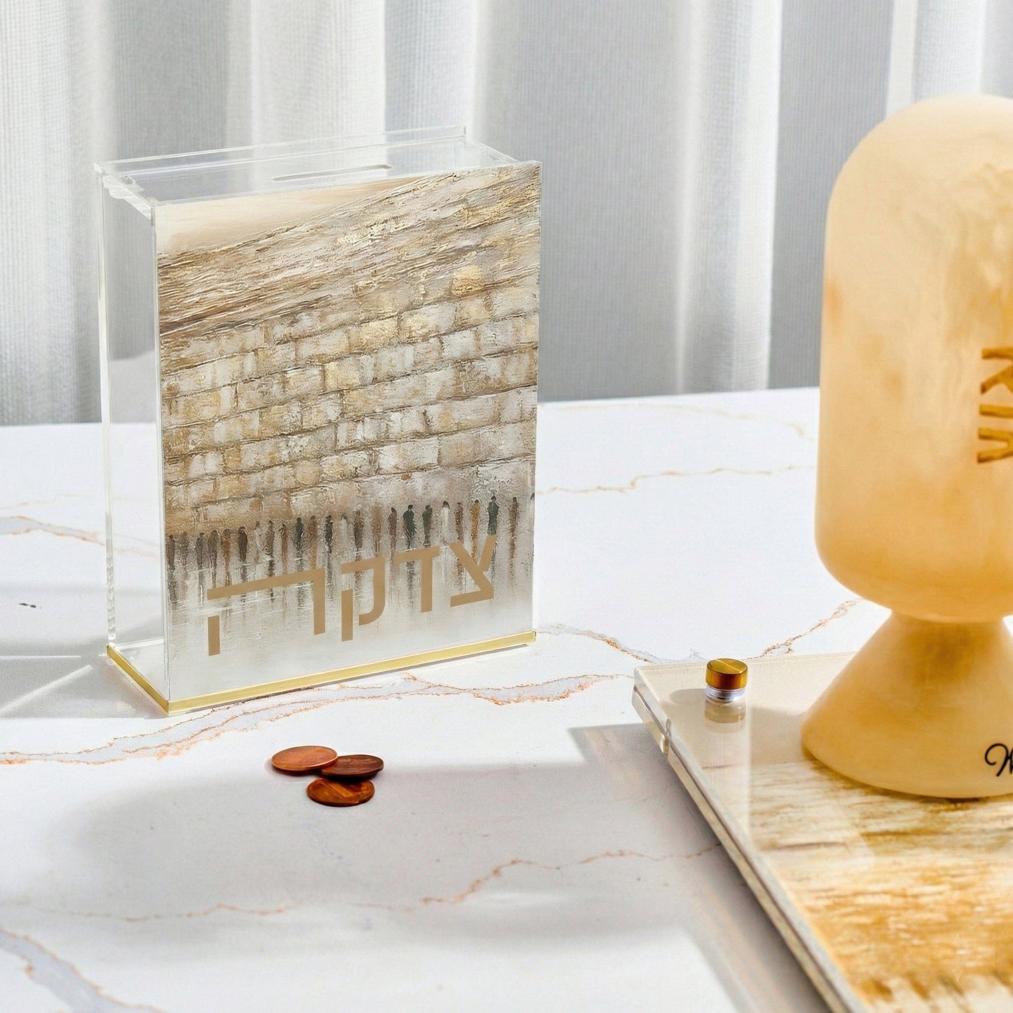 Jerusalem Taupe Tzedakah Box — styled in-room | Judaica Square Lakewood