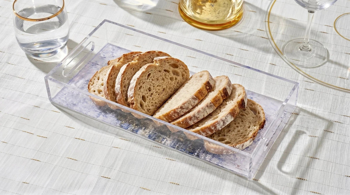 Close angled view of the Kosel Teal Bread Tray showing its 6" x 14" size
