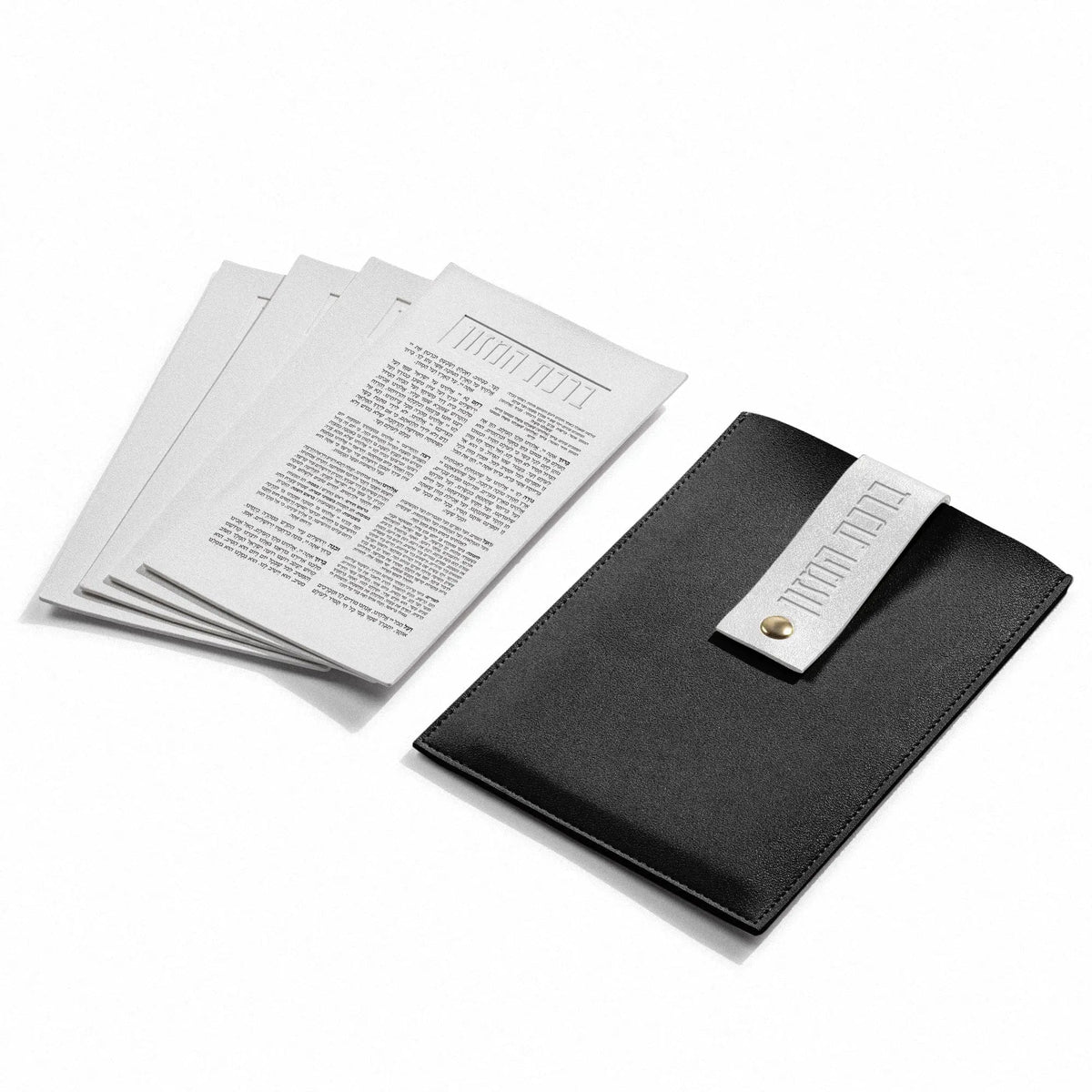 Black bencher pouch with white snap tab and four white bencher cards